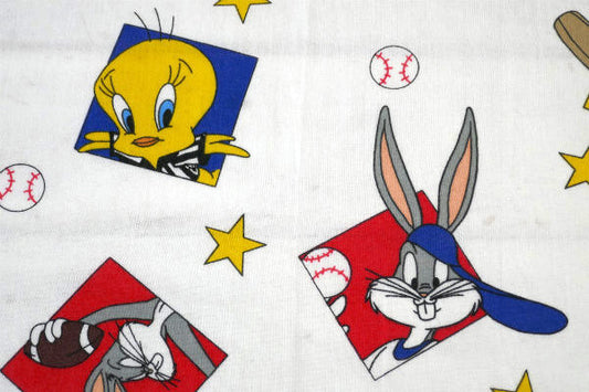 ルーニーテューンズ トゥイーティー バッグスバニー 野球&アメフト柄 カーテン生地 ファブリック