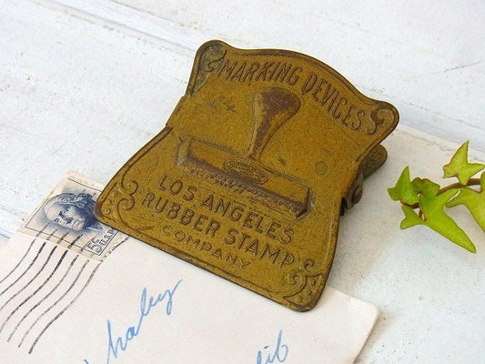 スタンプ柄・真鍮製・アンティーク・ノベルティ・OLDクリップ USA