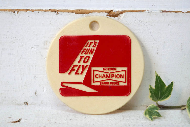 IT'S FUN TO FLY チャンピオンCHAMPION プラグ USA 1970y アドバタイジング 飛行機 ヴィンテージ キーホルダー