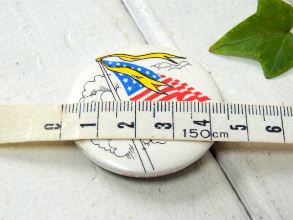 NEVER AGAIN・メッセージ アメリカンフラッグ・USA・星条旗・ヴィンテージ・缶バッジ