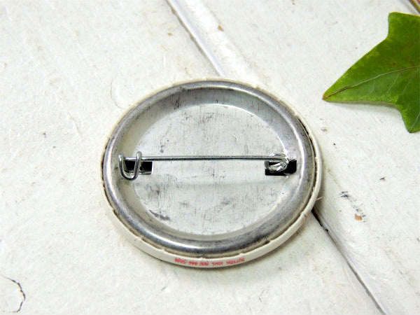 NEVER AGAIN・メッセージ アメリカンフラッグ・USA・星条旗・ヴィンテージ・缶バッジ